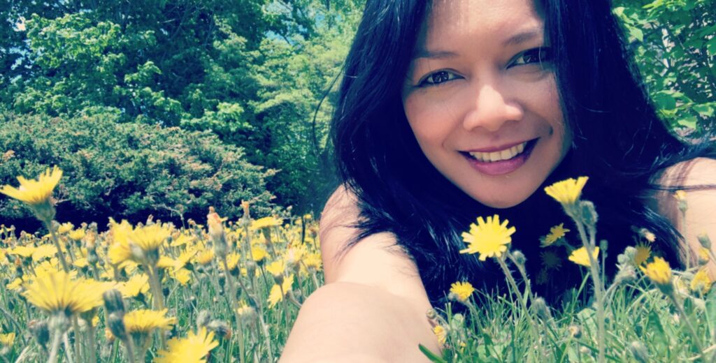 May Ling Su and flowers