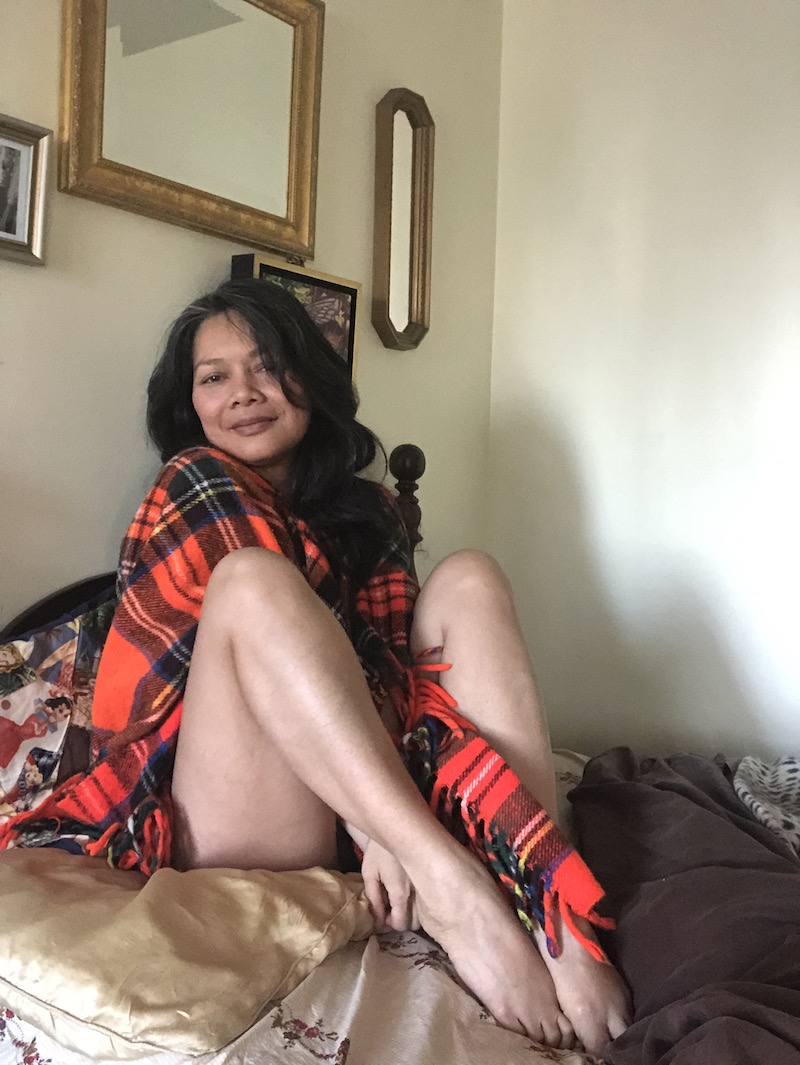 May Ling Su nude under her blanket, legs and feet coming out